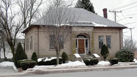The historic former Wood Memorial Library, a stone building, in South Windsor, Connecticut